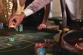 Casino-style game interface showing slots and table games on kora live